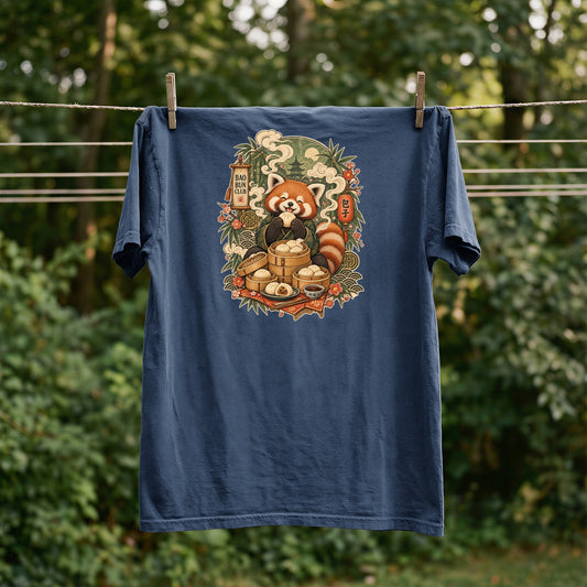 Dark blue t-shirt with a red panda eating a bao bun, text reads "Bao Bun Club" and "包子".
