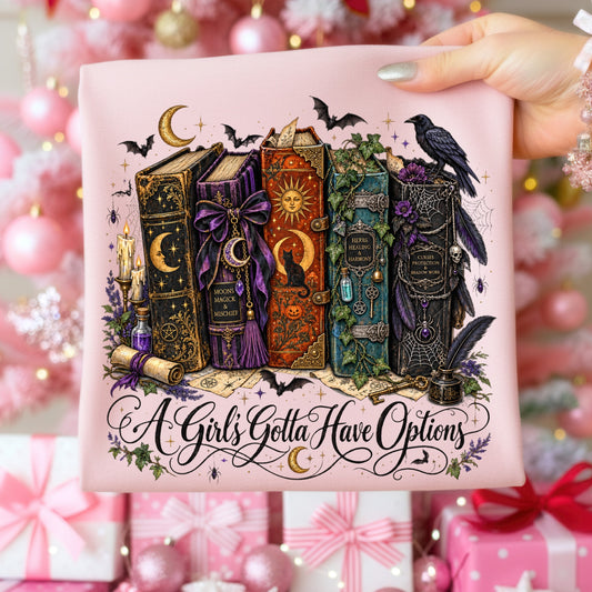 Illustration of witchy books with text "A Girl's Gotta Have Options".