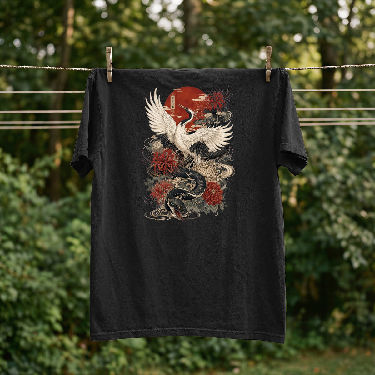 Black t-shirt with Japanese crane, snake, and floral design.