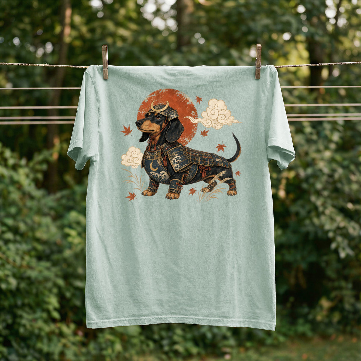 Dachshund in samurai armor with clouds and maple leaves on a light green t-shirt.