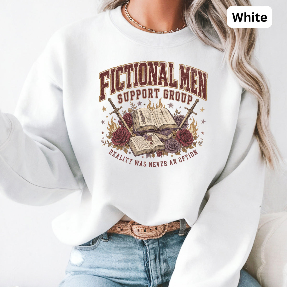 White sweatshirt with "Fictional Men Support Group" and "Reality Was Never An Option" text.