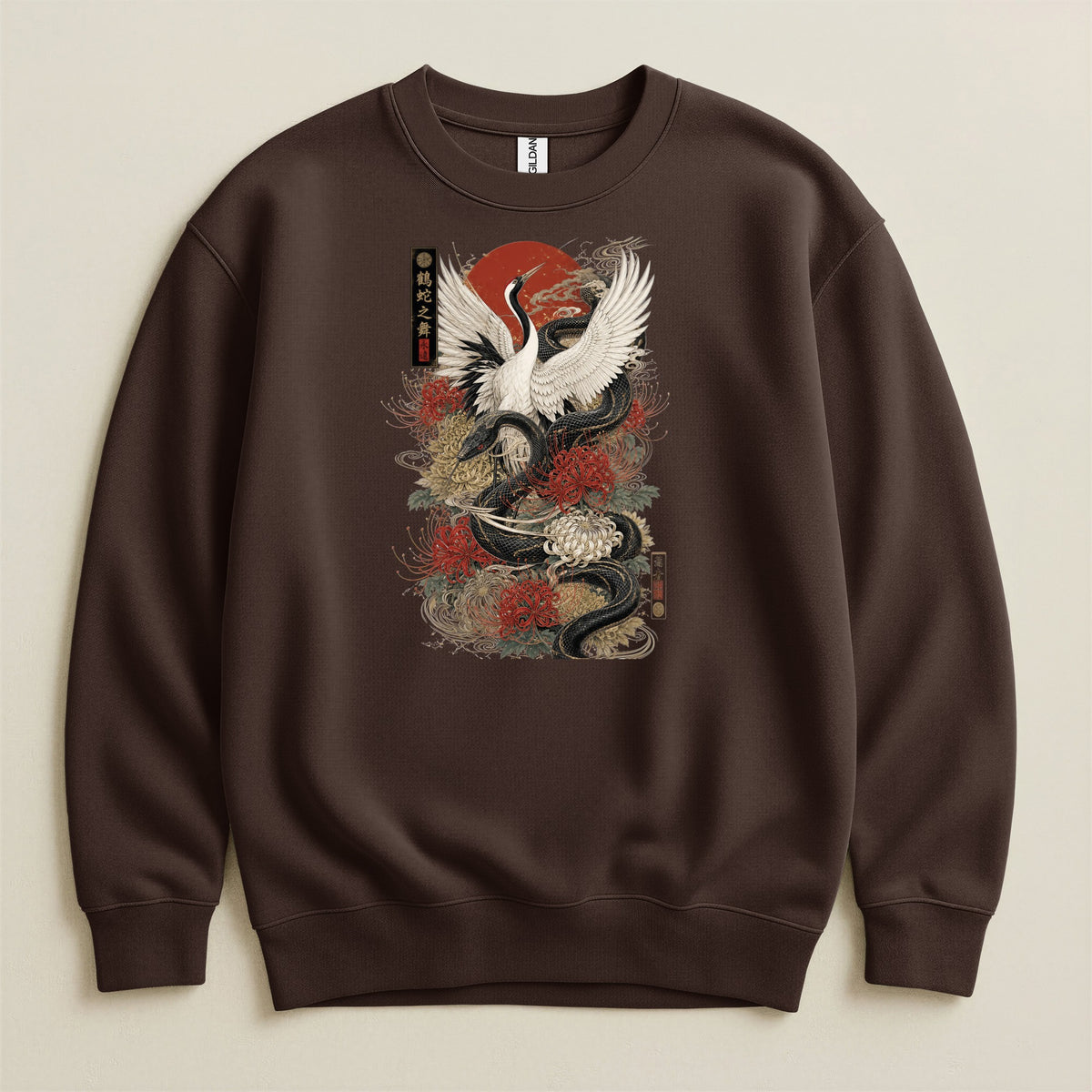 Brown sweatshirt with a dark Japanese-style print of a crane, snake, and flowers.
