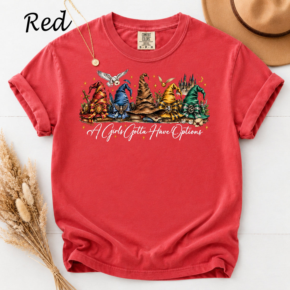 Red t-shirt with wizard hats and text "A Girls Gotta Have Options".