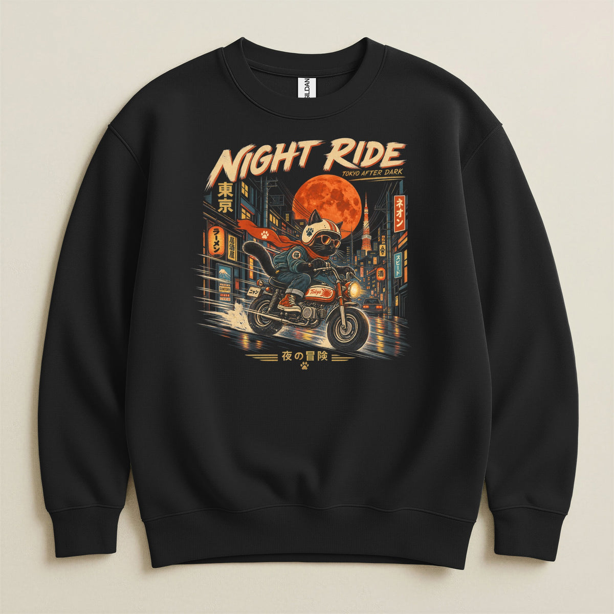 Black sweatshirt with a "Night Ride Tokyo After Dark" graphic featuring a cat on a motorcycle.