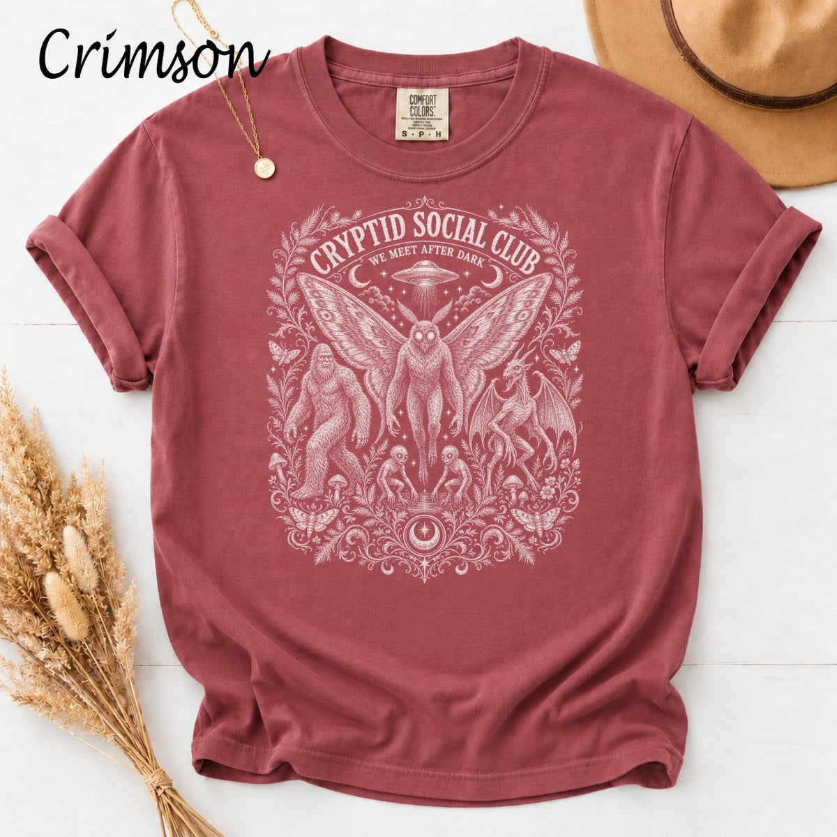 Crimson Comfort Colors t-shirt with cryptid designs and text "Cryptid Social Club We Meet After Dark".
