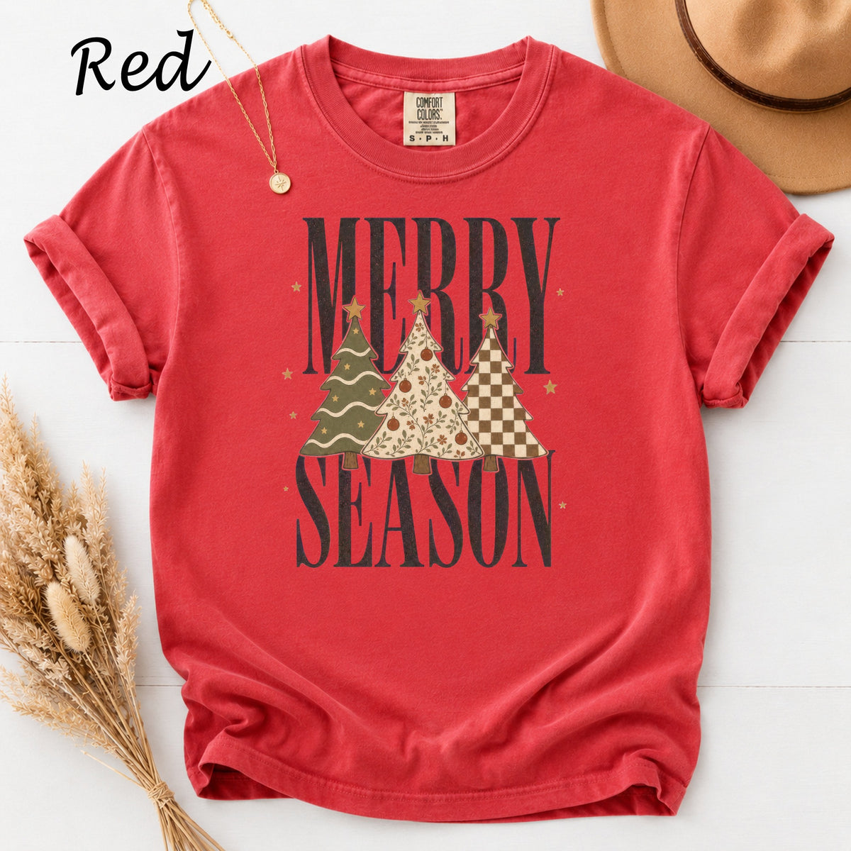 Red t-shirt with "Merry Season" text and three decorated Christmas trees.