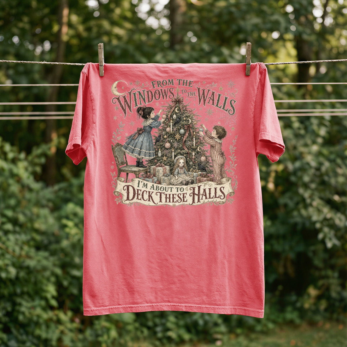 Red t-shirt with Christmas illustration and text "FROM THE WINDOWS TO THE WALLS I'M ABOUT TO DECK THESE HALLS."