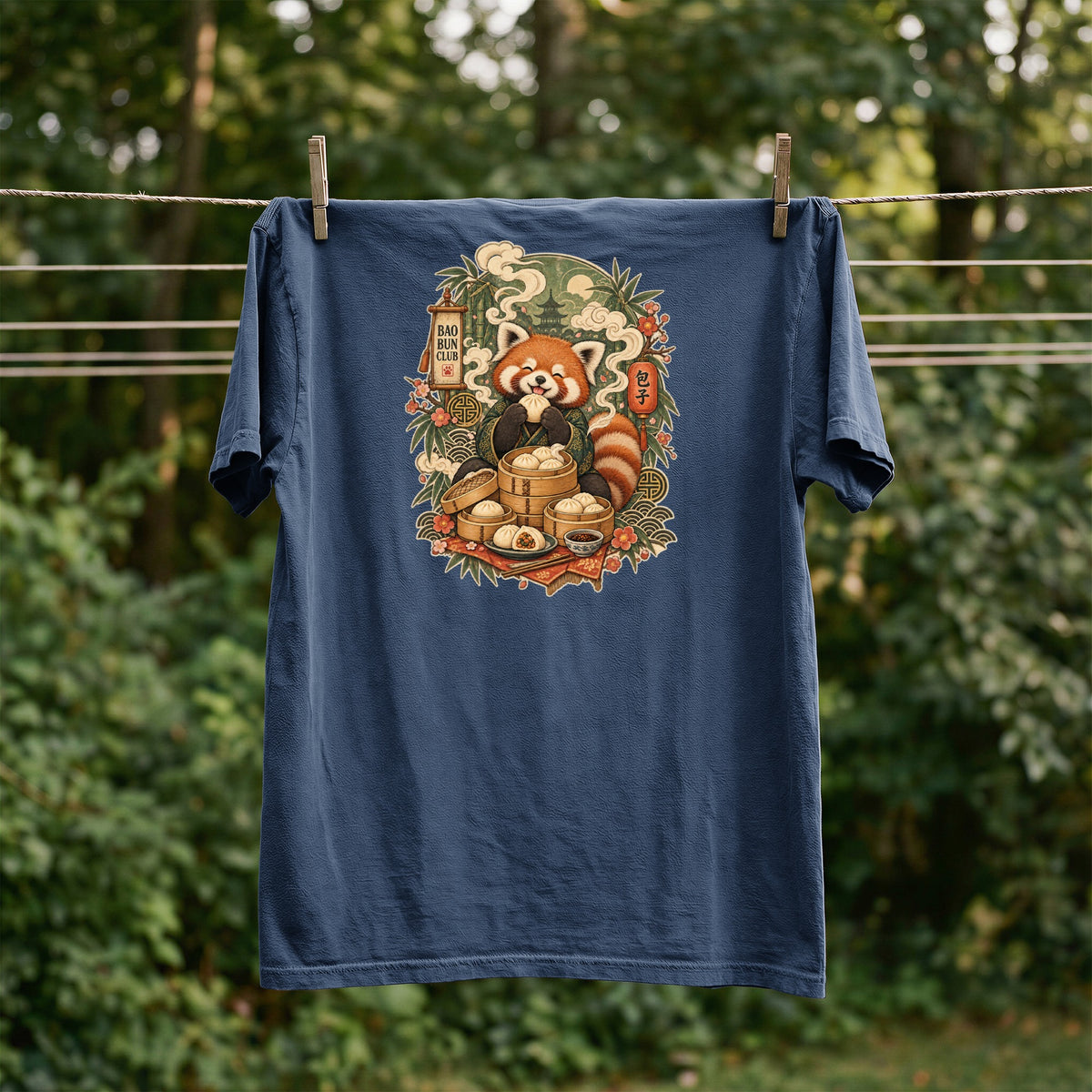 Dark blue t-shirt with a red panda eating a bao bun, text reads "Bao Bun Club" and "包子".