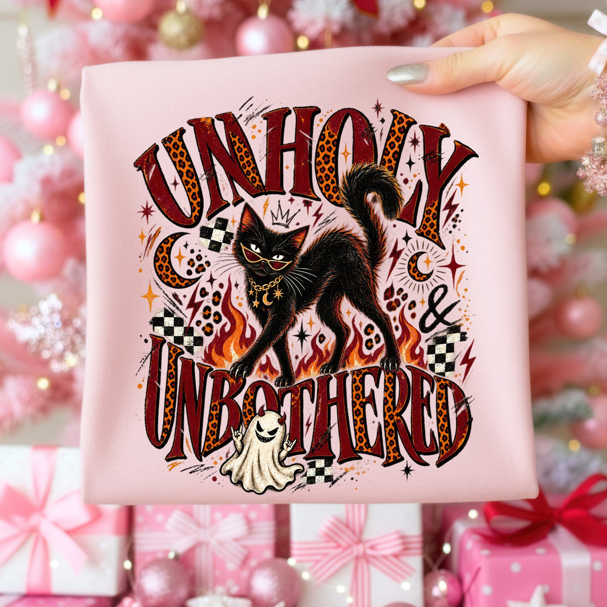 Black cat with sunglasses and necklace on flames with text "Unholy & Unbothered".