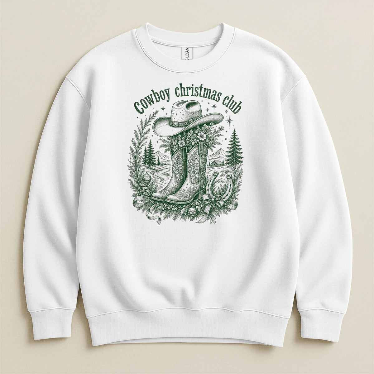 White sweatshirt with "Cowboy Christmas Club" text and cowboy boot graphic.