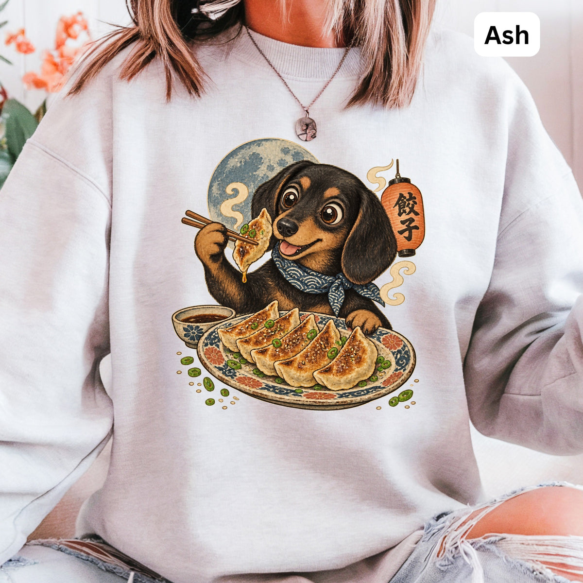 Dachshund with chopsticks eating dumplings, with Japanese lantern and moon.