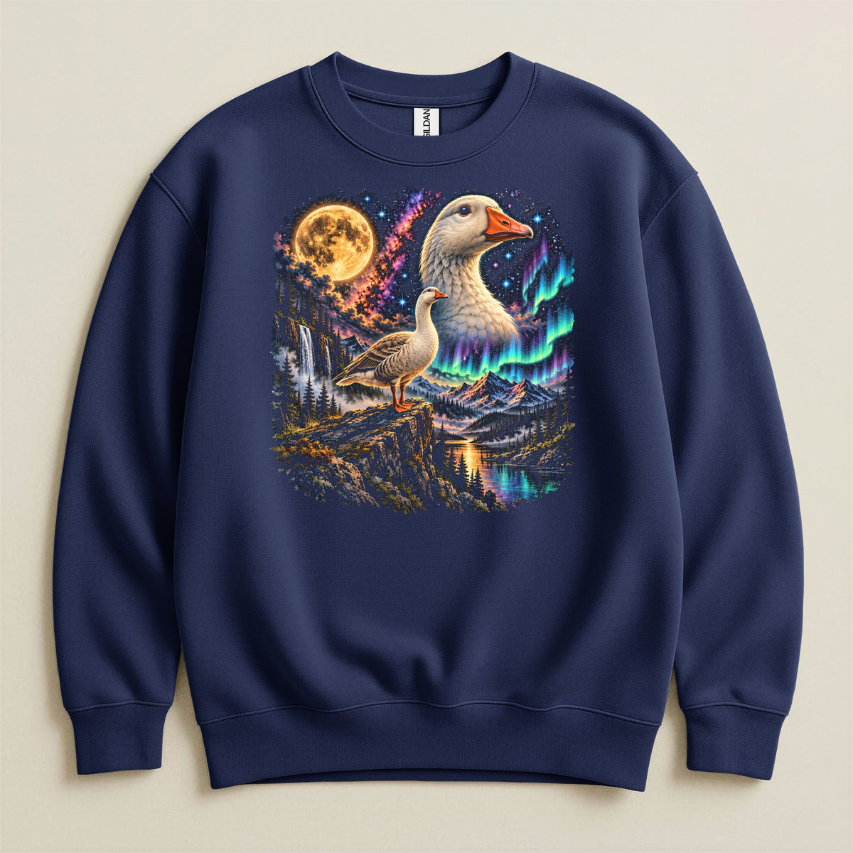 Navy sweatshirt with a surreal graphic of geese, moon, aurora, and mountains.