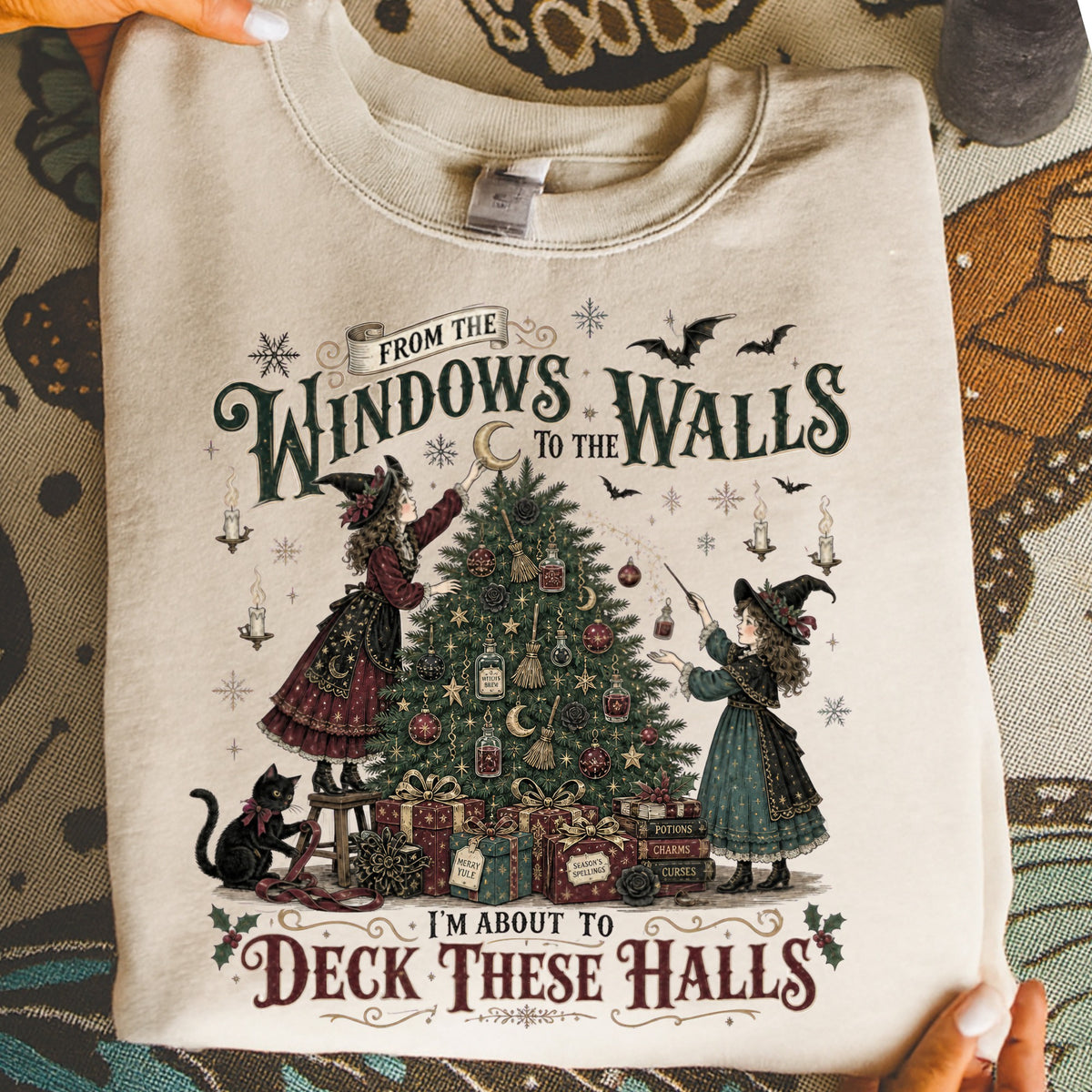 Two witches decorate a Christmas tree with potions, charms, and curses.