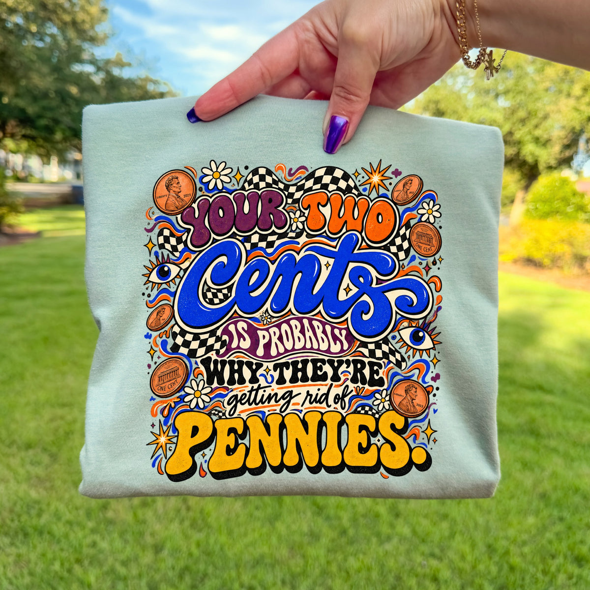 Light blue t-shirt with "Your Two Cents Is Probably Why They're Getting Rid of Pennies" text.