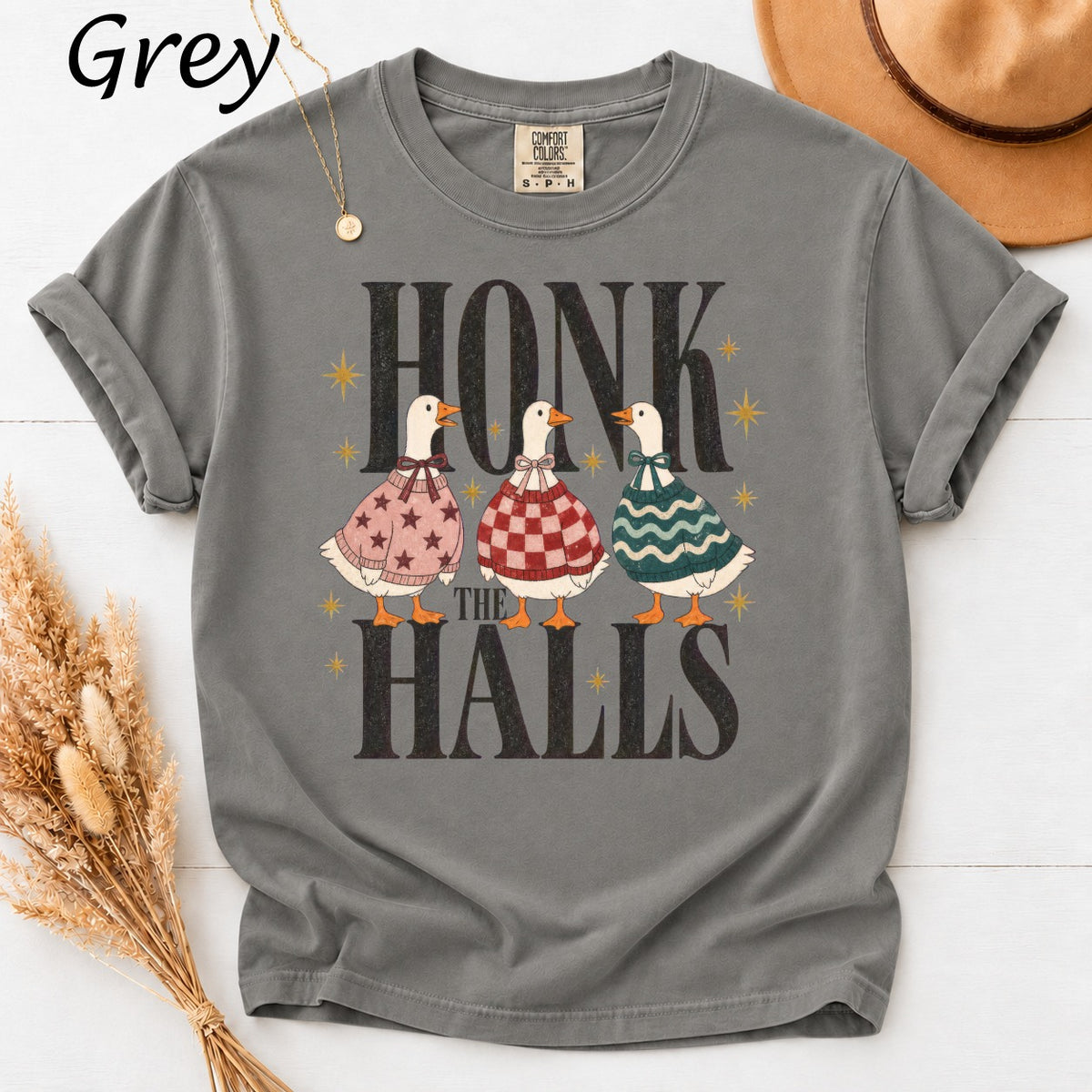 Grey t-shirt with three ducks in festive sweaters and "Honk the Halls" text.