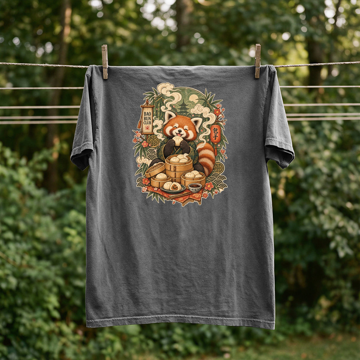 Dark gray t-shirt with a red panda eating dumplings and "Bao Bun Club" text.