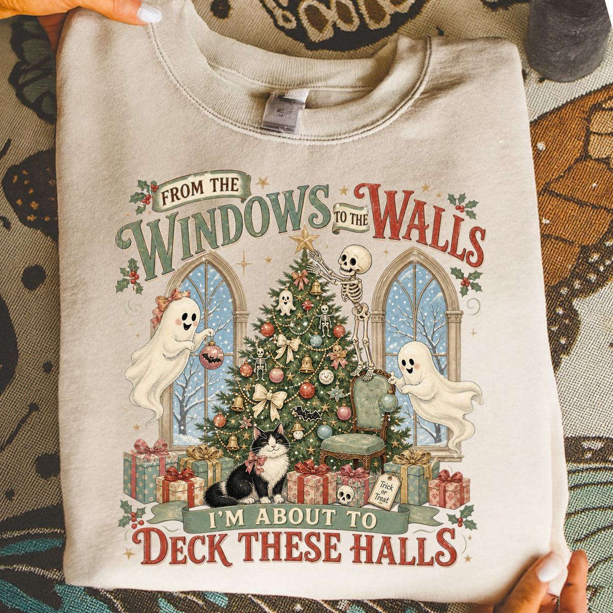 Skeleton decorating Christmas tree with ghosts, cat, and gifts; text reads "From the Windows to the Walls, I'm About to Deck These Halls".