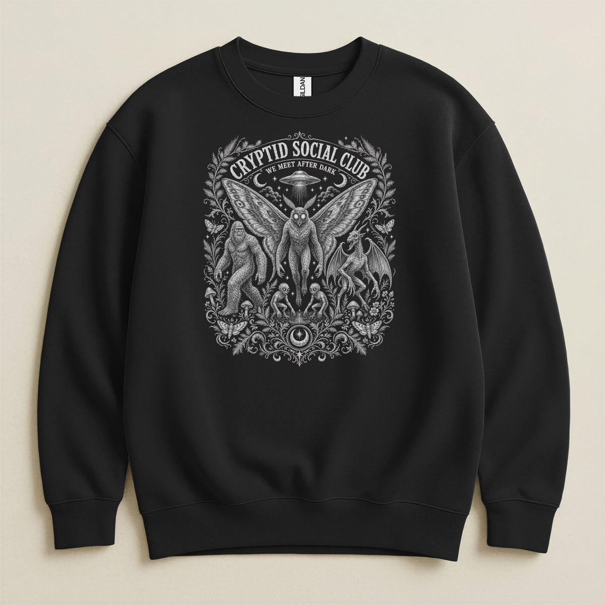 Black sweatshirt with a detailed graphic of cryptids and the text "Cryptid Social Club."