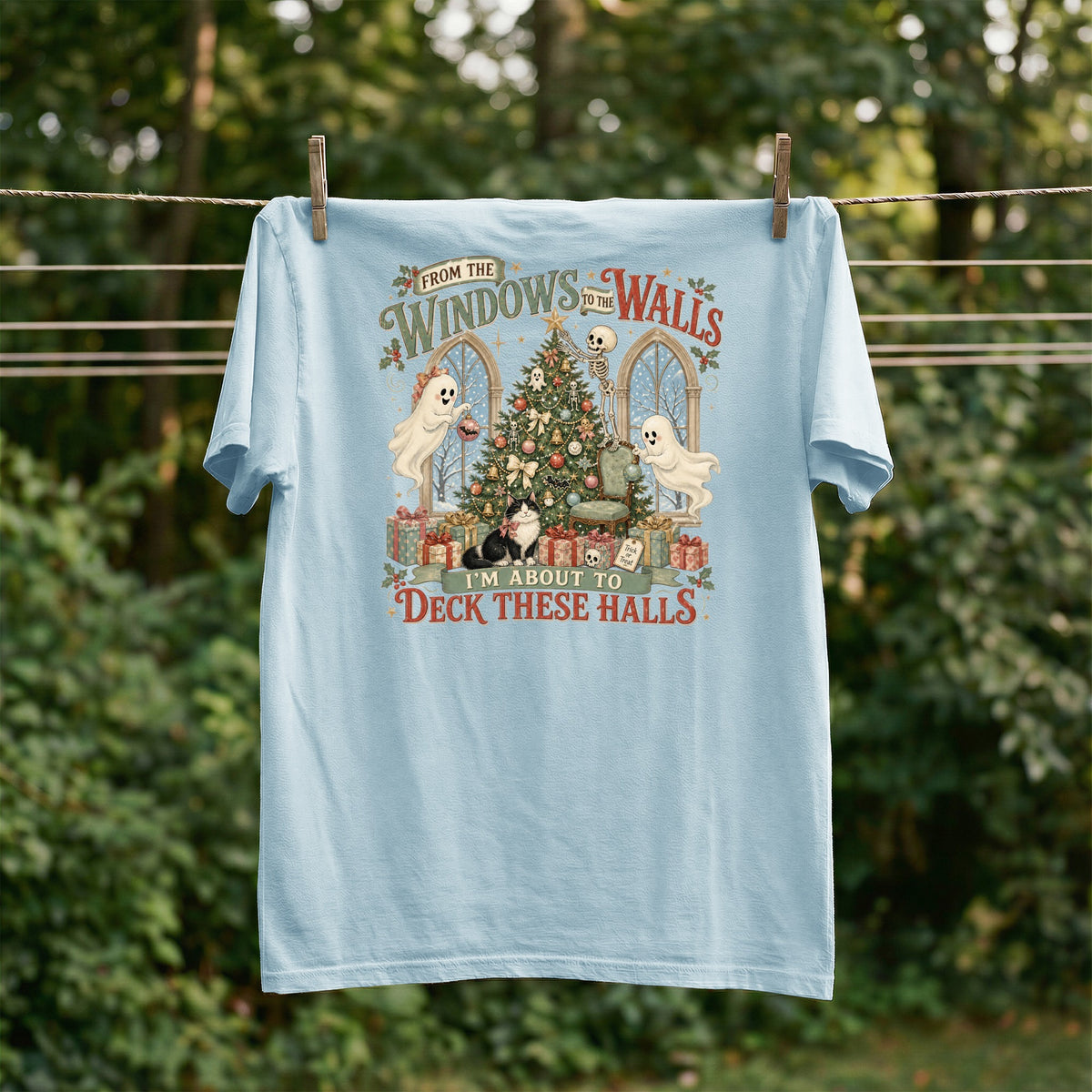 Light blue shirt with "From the Windows to the Walls, I'm About to Deck These Halls" graphic.