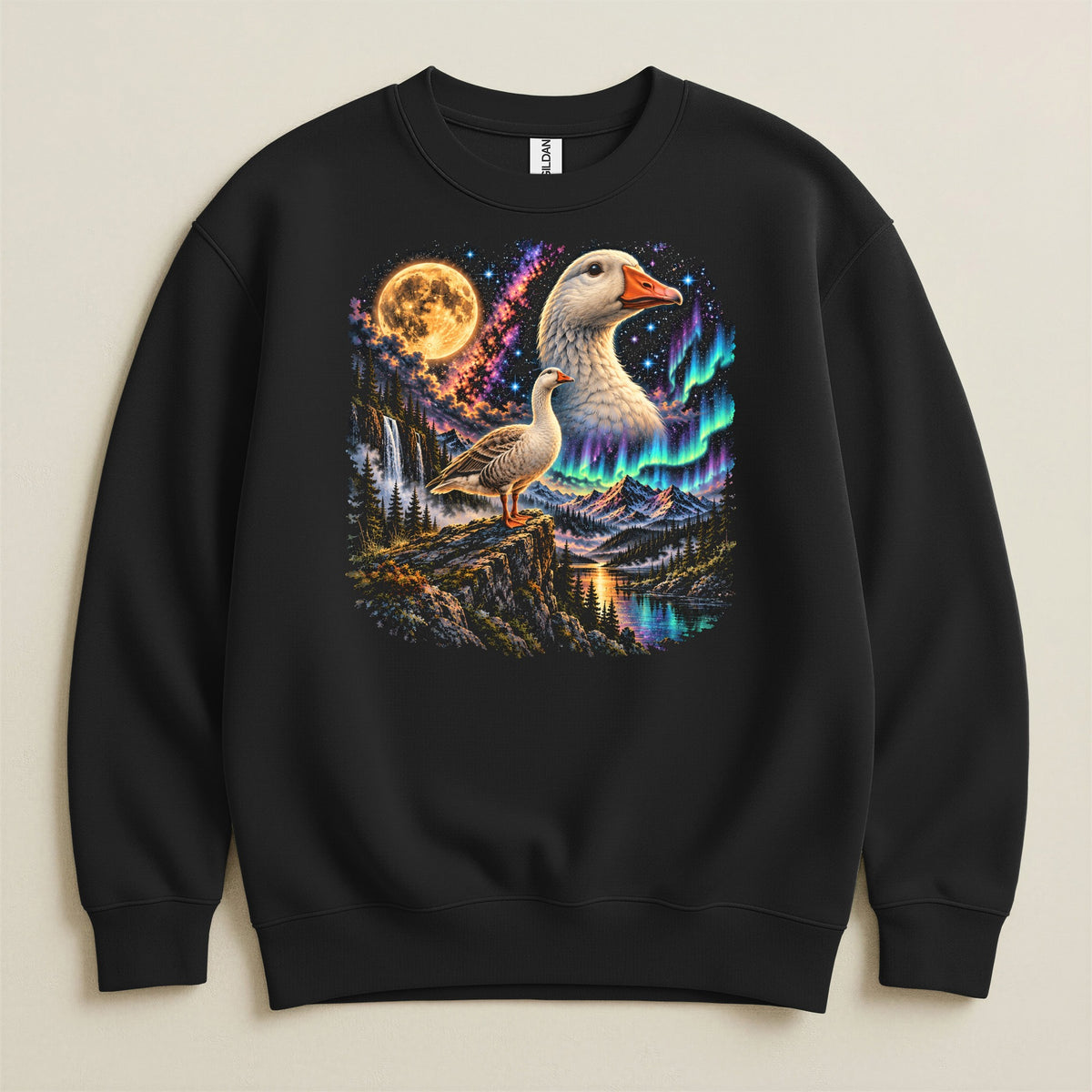 Black sweatshirt with a goose standing on a cliff under a full moon and aurora borealis.