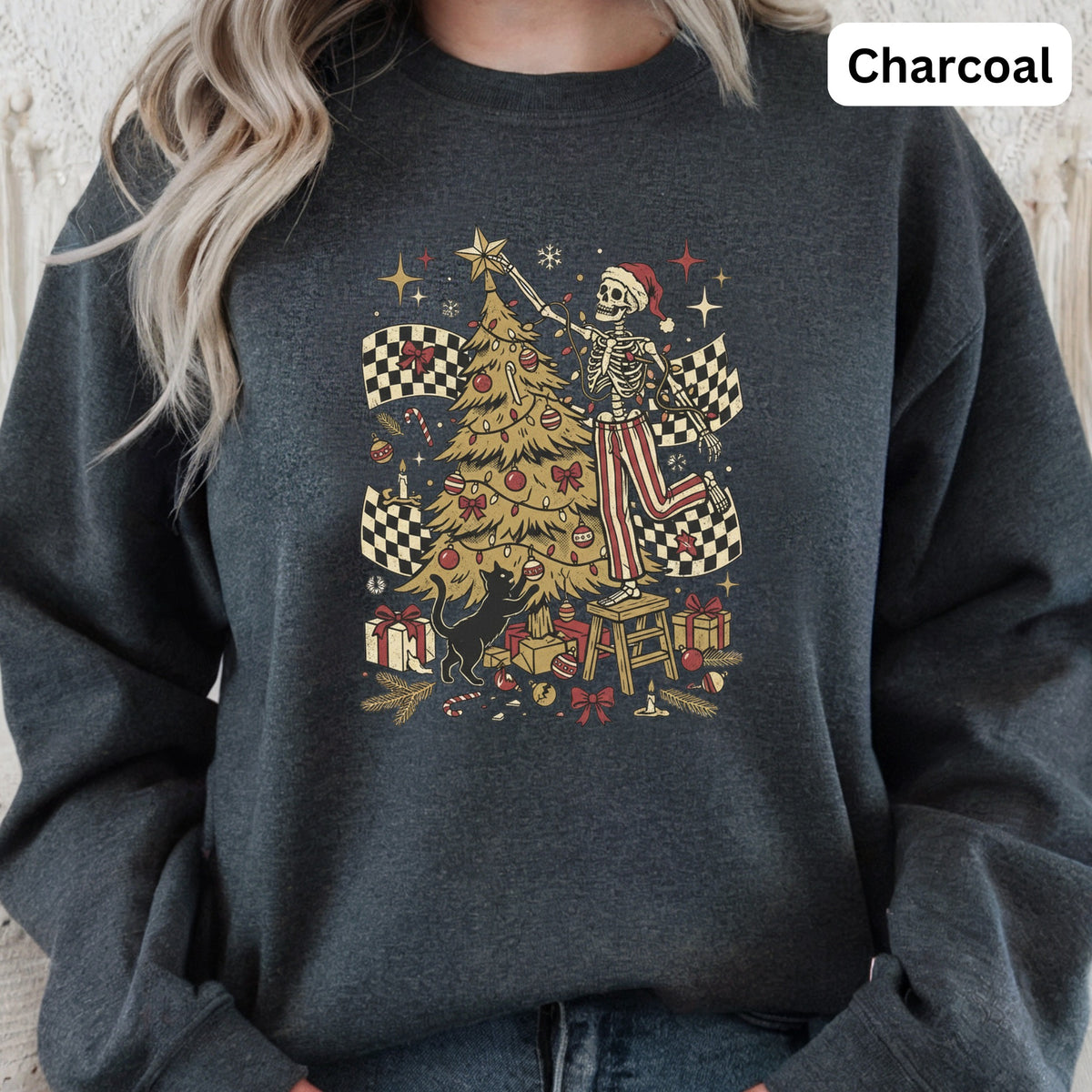 Skeleton decorating Christmas tree with racing flags, cat, and gifts.