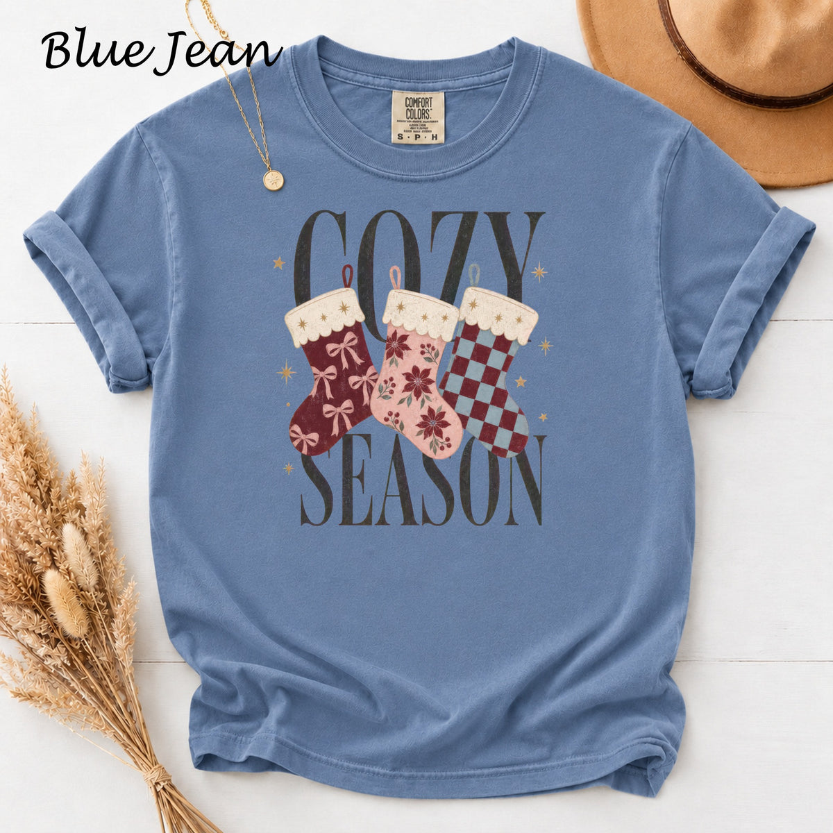 Blue Jean t-shirt with "Cozy Season" text and three Christmas stockings.
