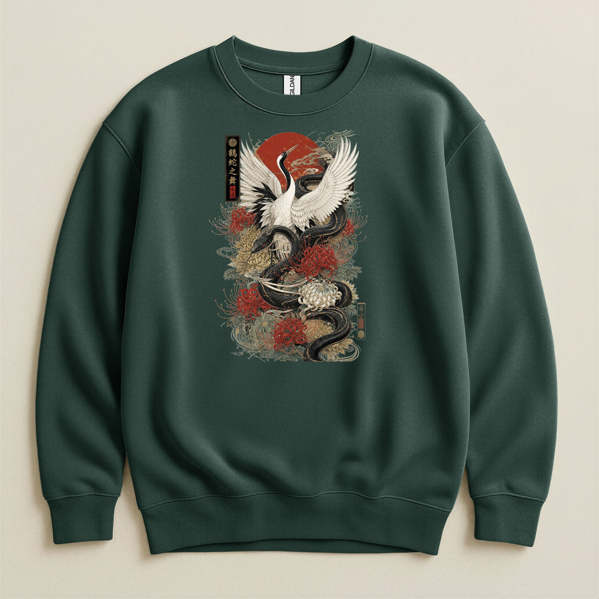 Green sweatshirt with a dark snake, white crane, red sun, and floral design.