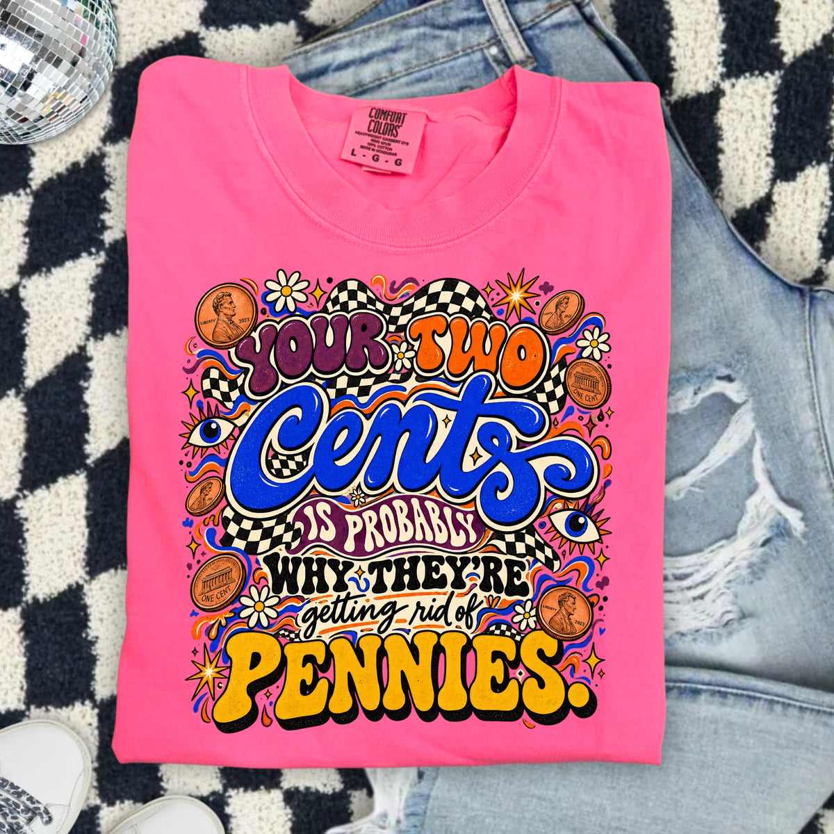 Pink t-shirt with "Your Two Cents is Probably Why They're Getting Rid of Pennies." graphic.