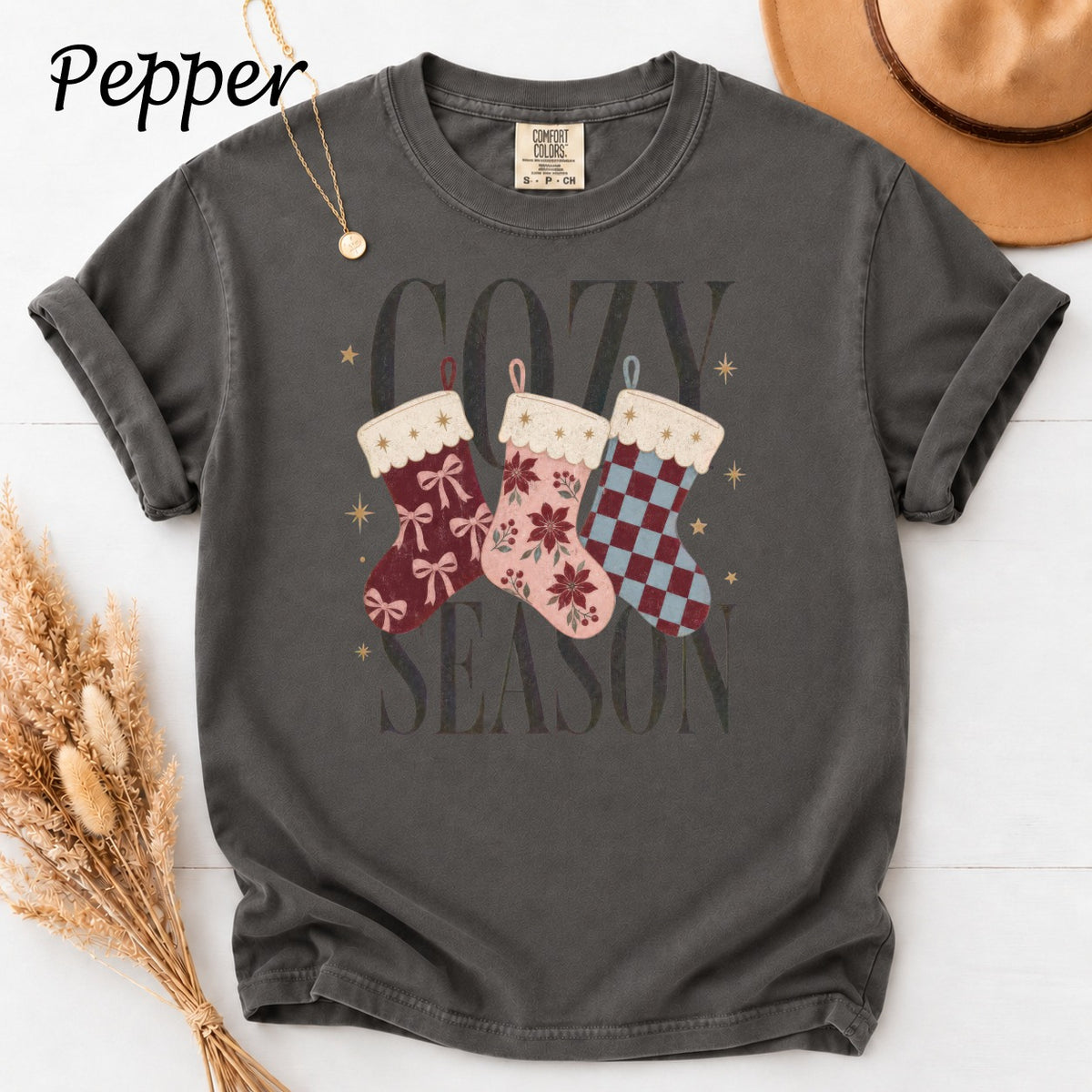 Gray t-shirt with "Cozy Season" and holiday stockings graphic.