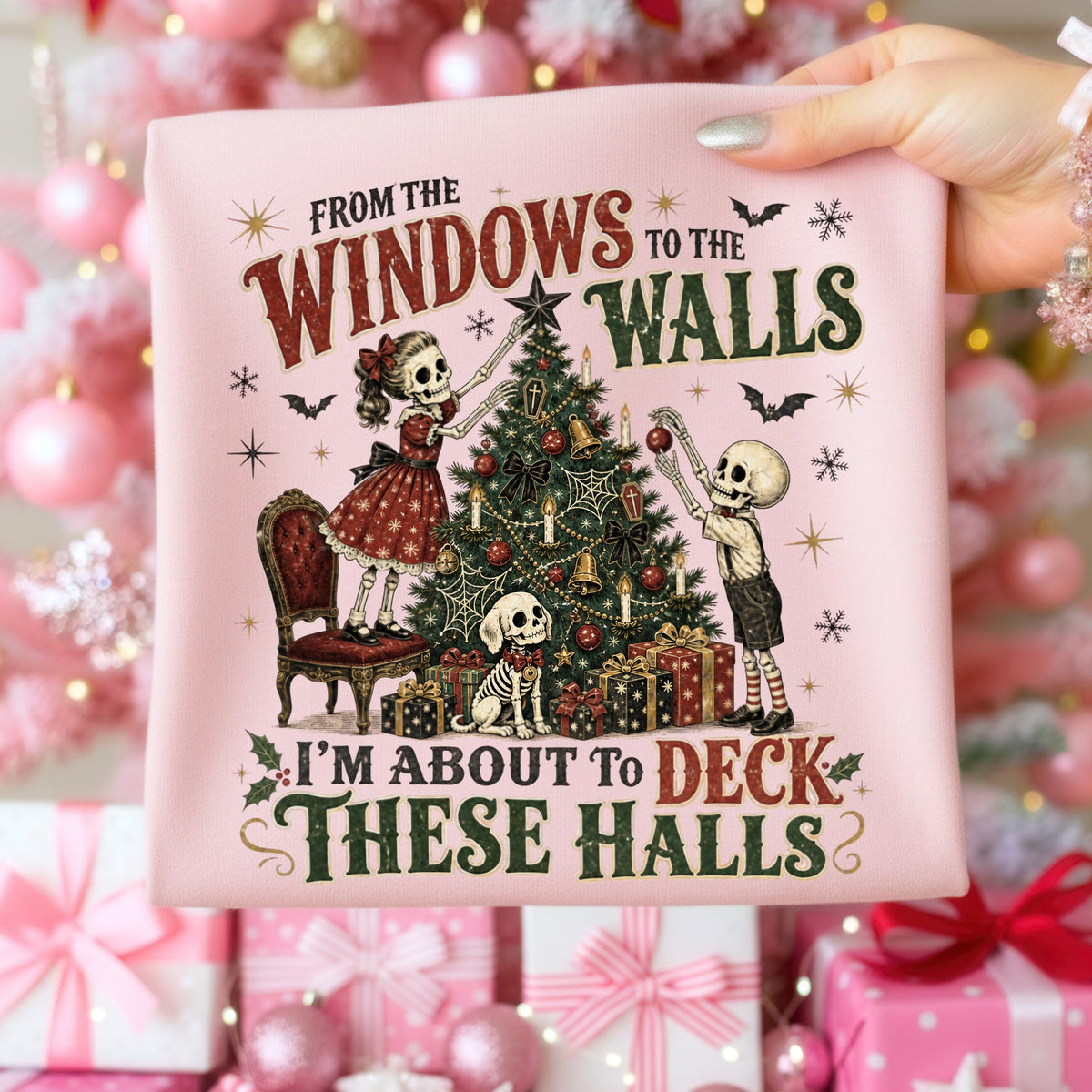 Skeleton family decorates Christmas tree with text "I'm about to deck these halls."