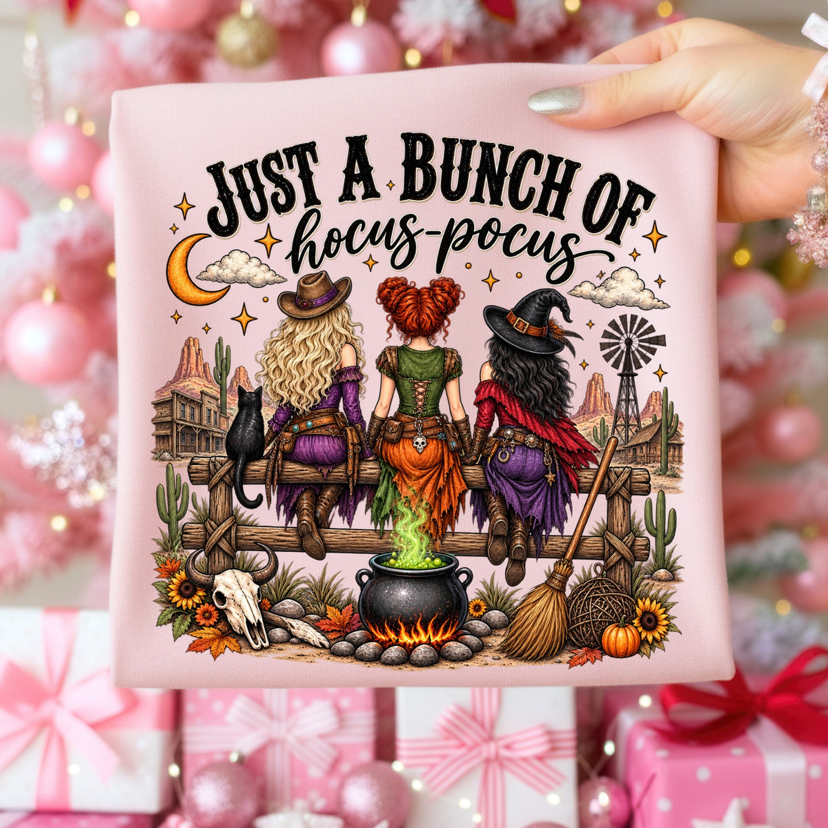 Three witches sit on a fence with "Just a Bunch of Hocus-Pocus" text.
