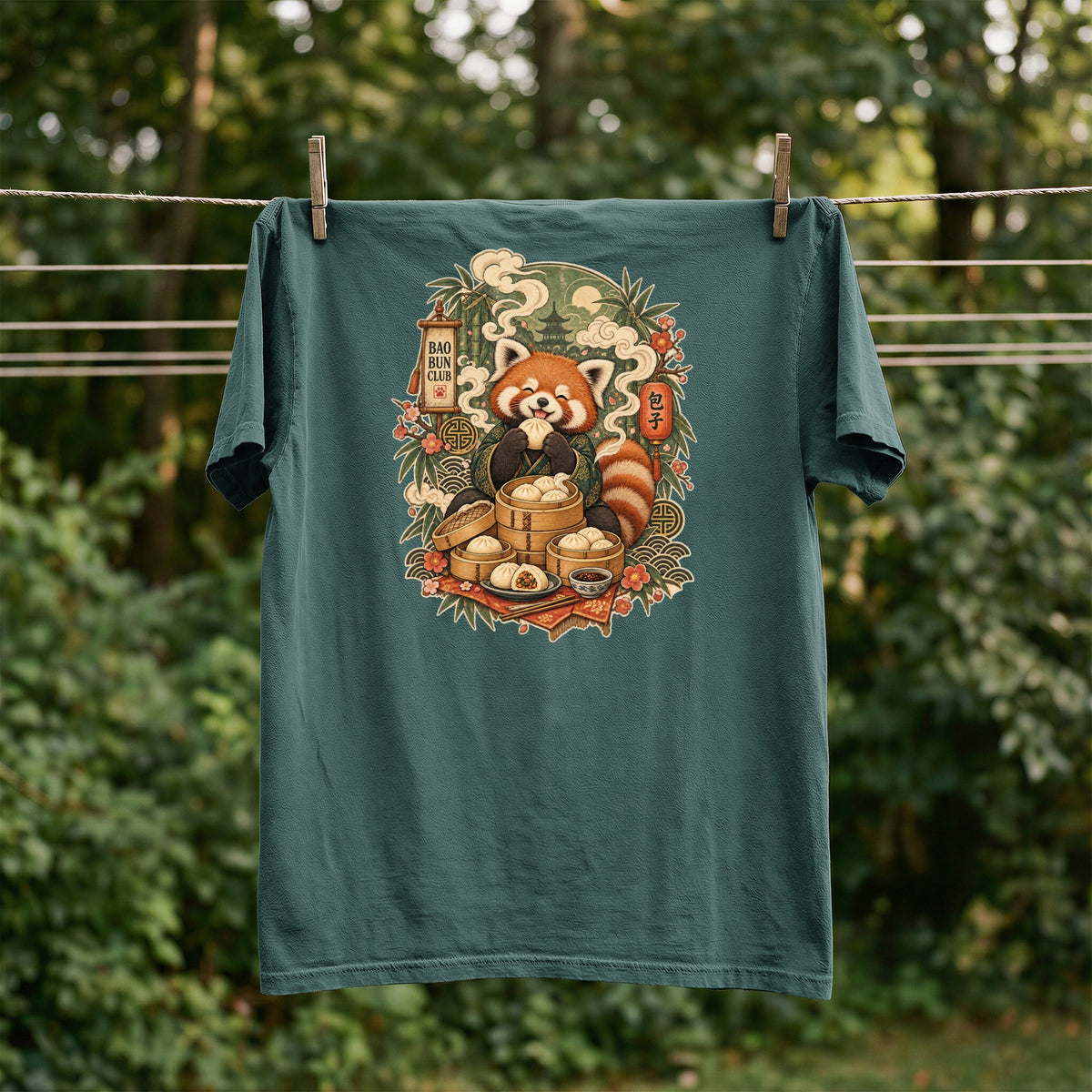 Teal t-shirt with a red panda eating dumplings, text reads "Bao Bun Club" and "包子".