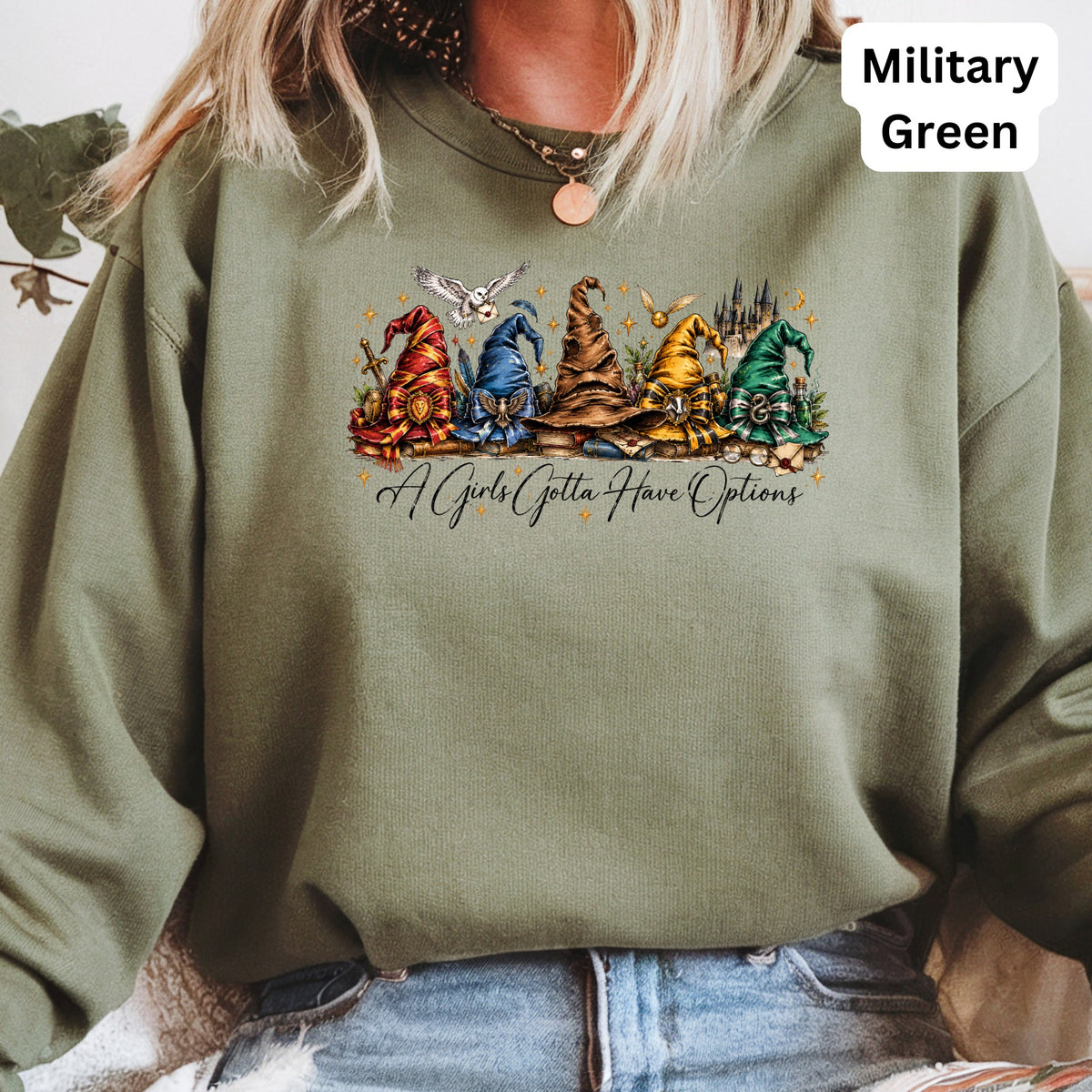 Green sweatshirt with wizard hats and "A Girls Gotta Have Options" text.