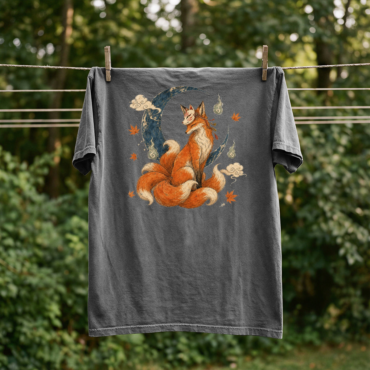 Dark grey t-shirt with a nine-tailed fox sitting on a crescent moon.