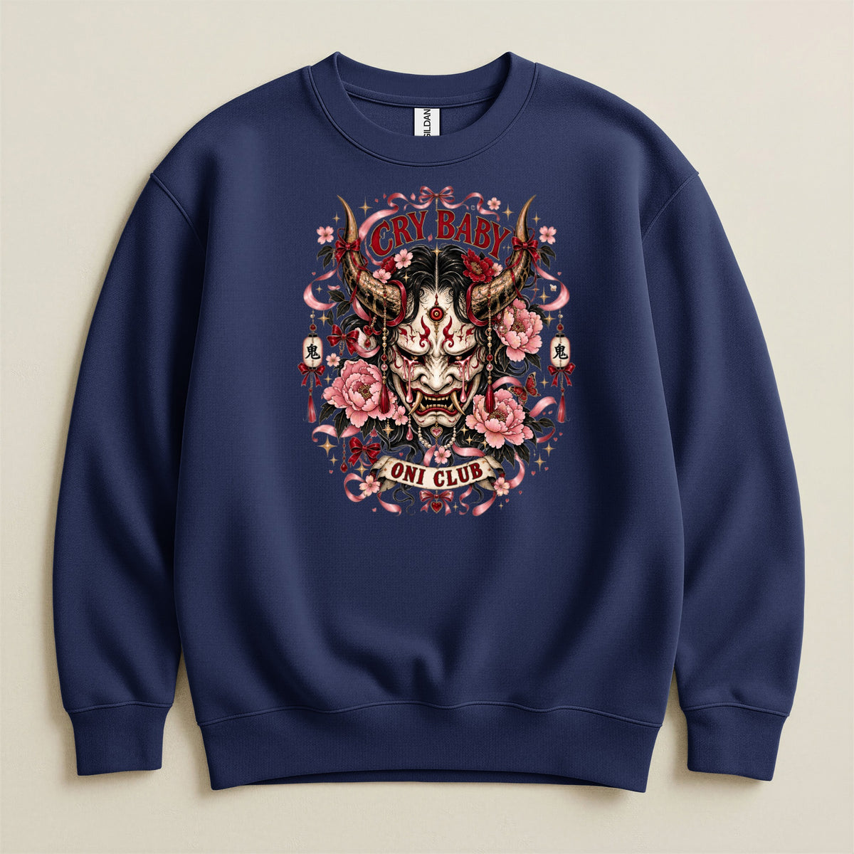 Navy sweatshirt with Japanese Oni mask, flowers, and "CRY BABY ONI CLUB" text.
