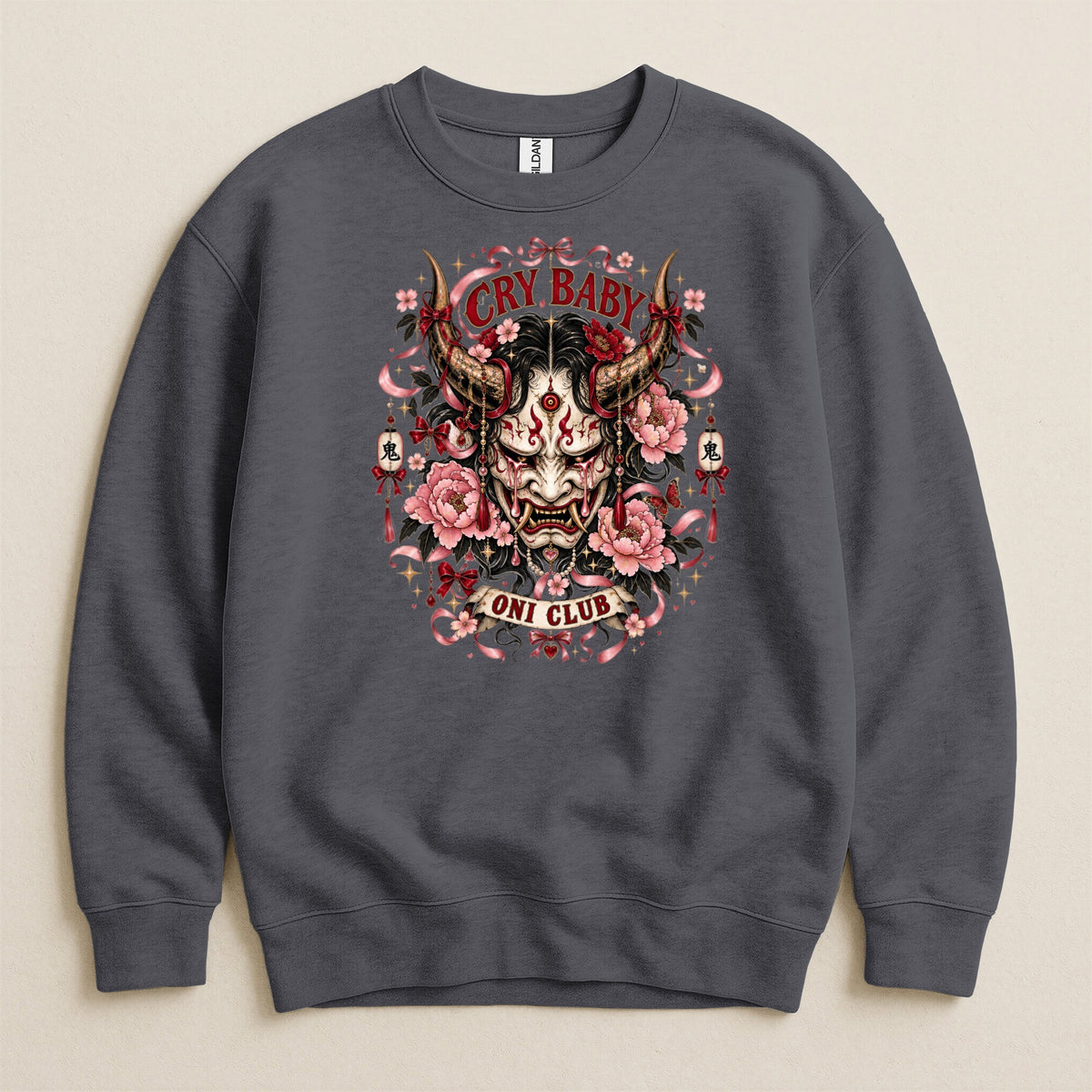 Dark grey sweatshirt with a graphic of a crying Oni mask, flowers, and "CRY BABY ONI CLUB" text.