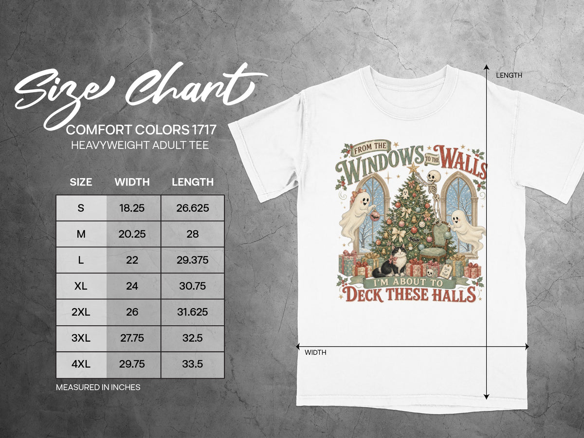 White t-shirt with skeleton, ghosts, cat, and Christmas tree graphic reading "I'm About to Deck These Halls."