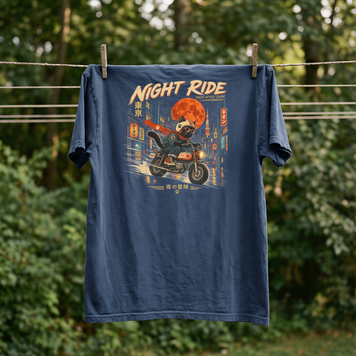Dark blue t-shirt with "Night Ride Tokyo After Dark" graphic of a cat on a motorcycle.
