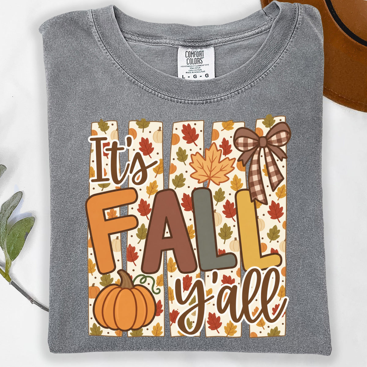 Grey t-shirt with "It's FALL y'all" graphic featuring pumpkins and fall leaves.