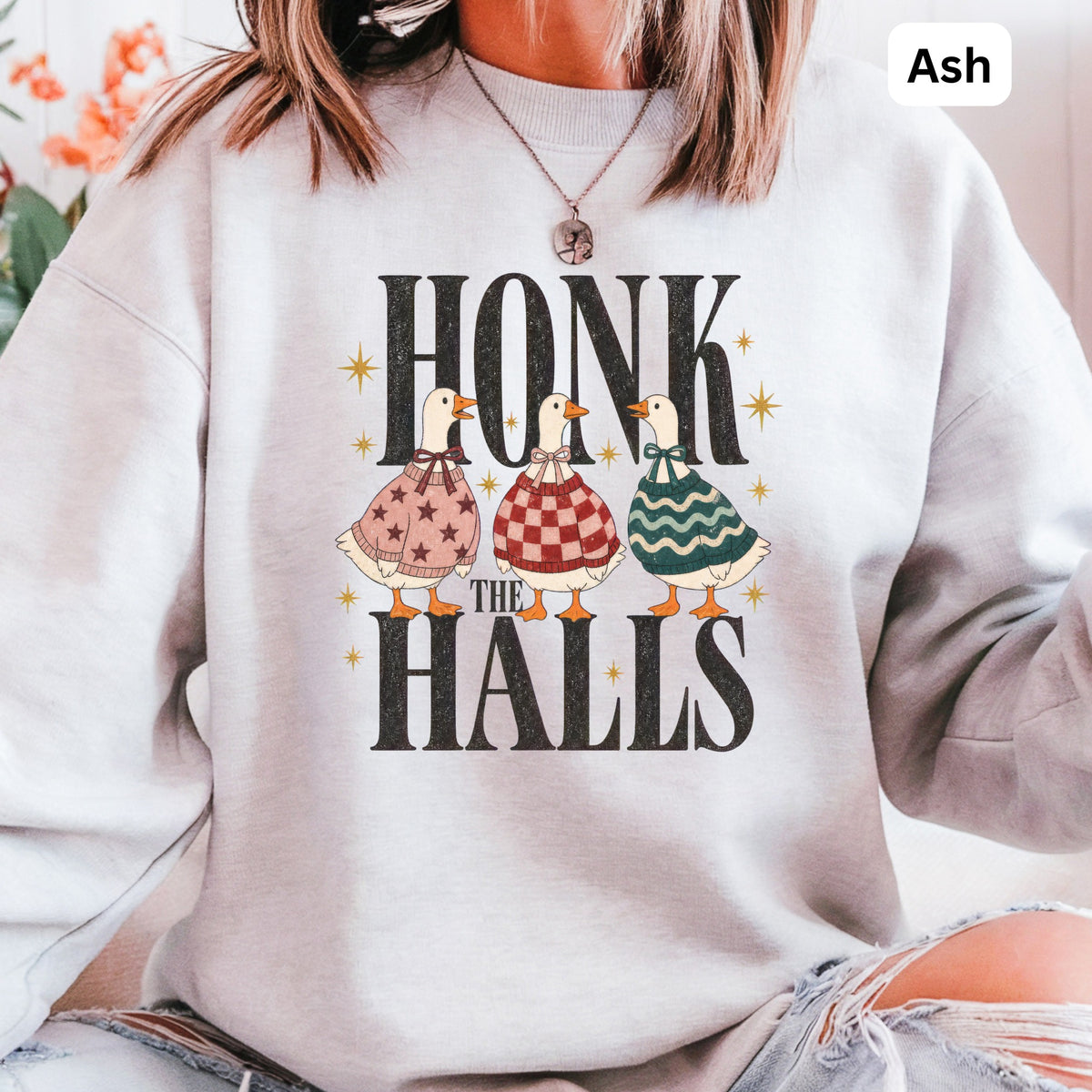 Ash sweatshirt with graphic: three ducks in sweaters, text "HONK THE HALLS".