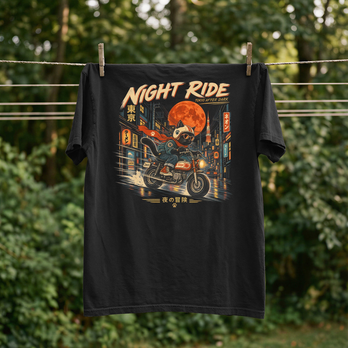 Black t-shirt with "Night Ride Tokyo After Dark" graphic of cat on motorcycle.