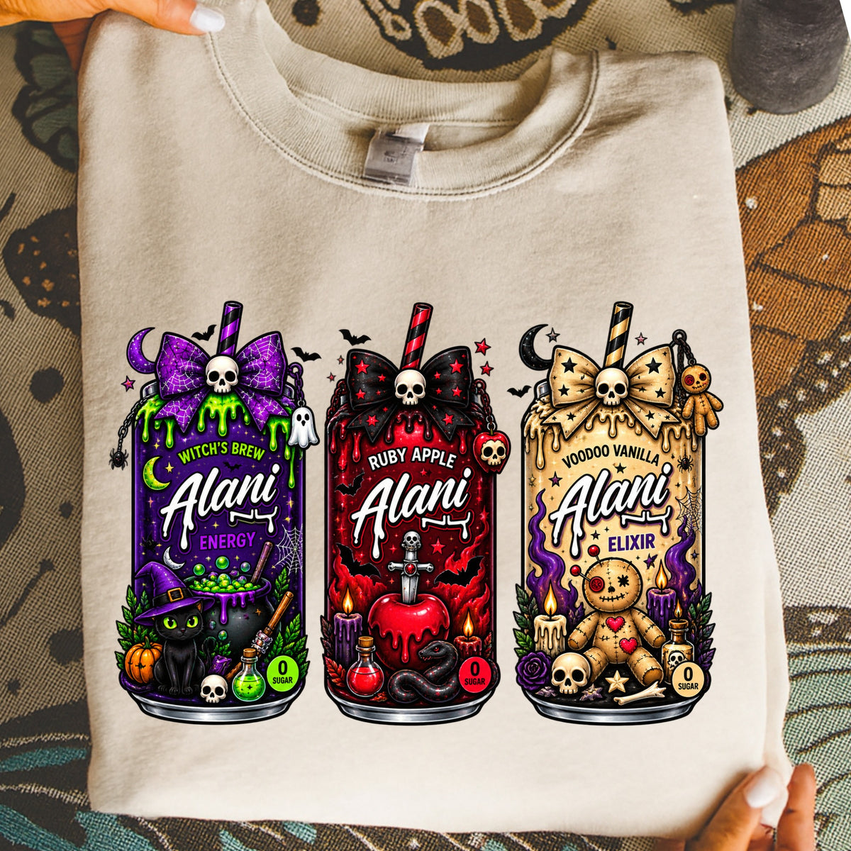 T-shirt with three Halloween-themed "Alani" drink designs: Witch's Brew, Ruby Apple, and Voodoo Vanilla.