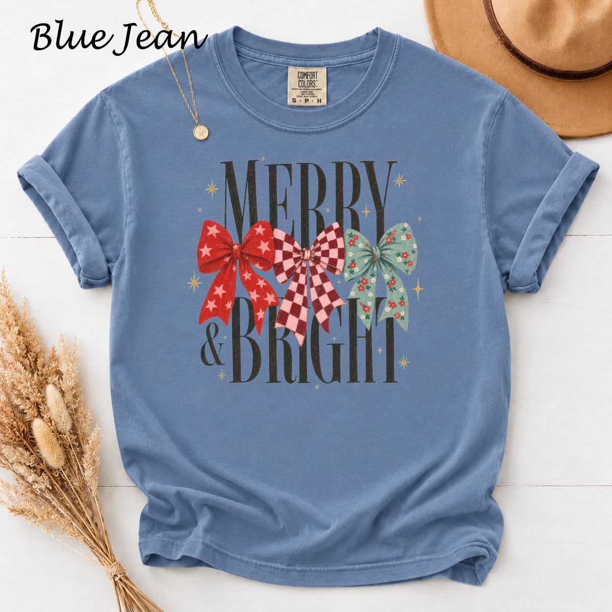 Blue Jean shirt with "MERRY & BRIGHT" text and three festive bows.