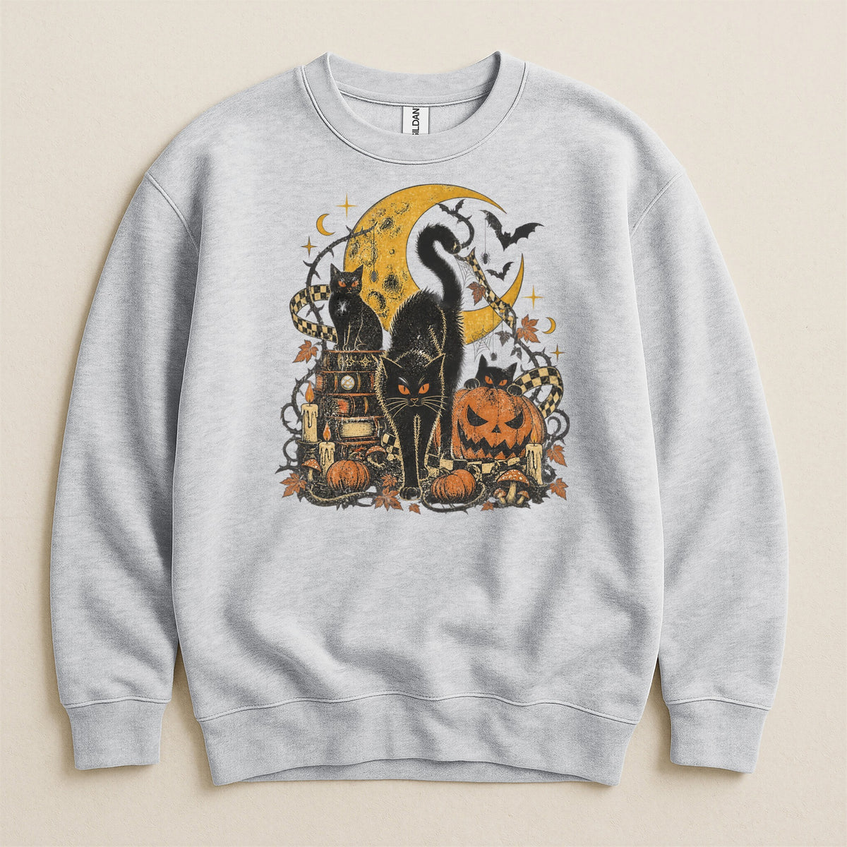 Light gray sweatshirt with a vintage Halloween graphic of black cats, moon, pumpkins, and bats.