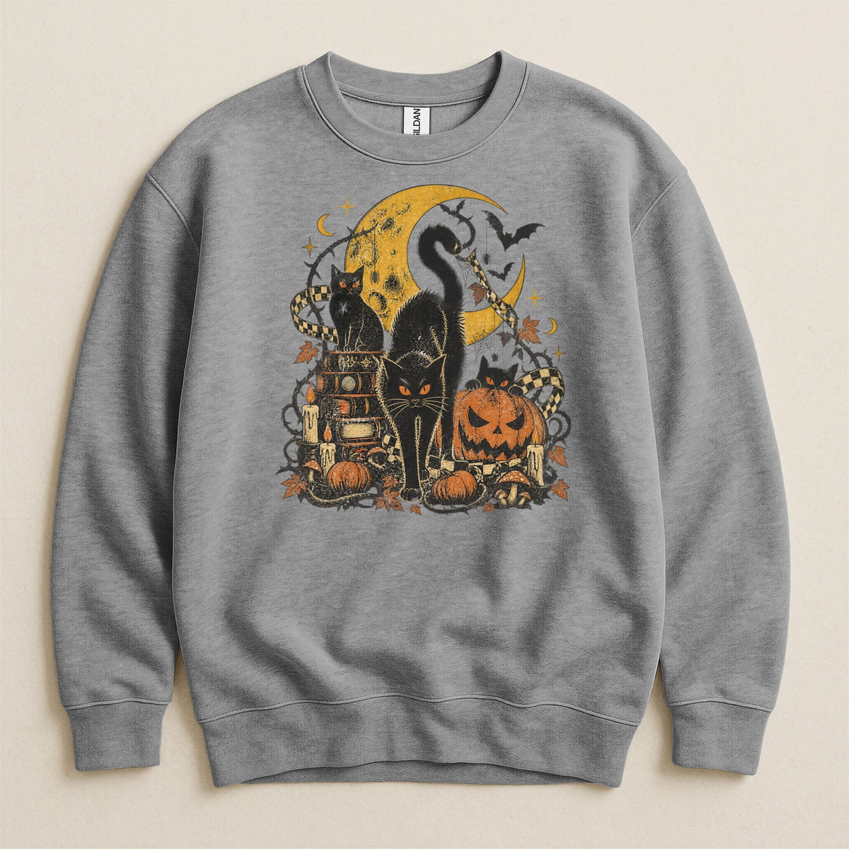 Halloween graphic with black cats, jack-o'-lantern, moon, candles, and books.