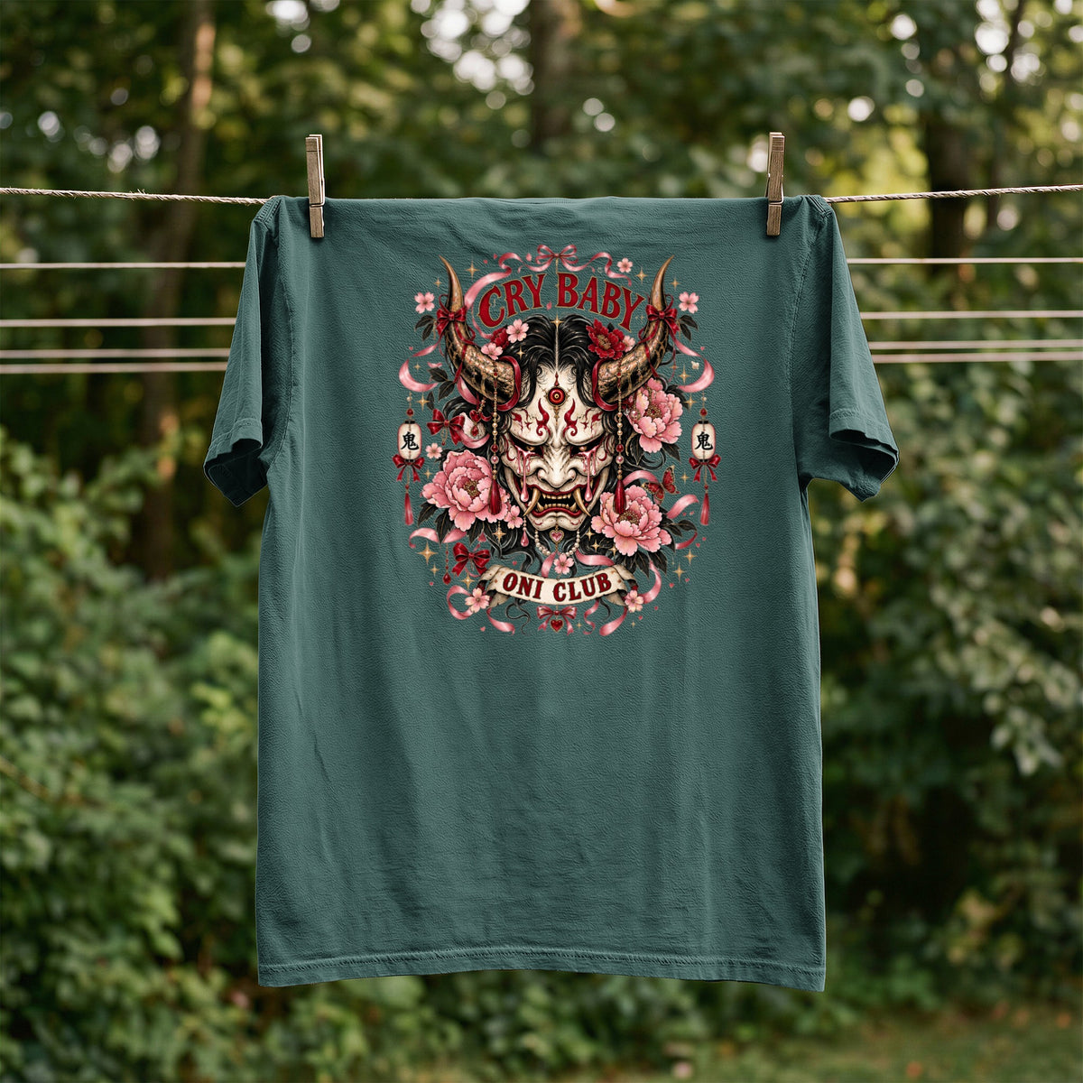 Teal t-shirt with Oni mask, flowers, and "CRY BABY" and "ONI CLUB" text.