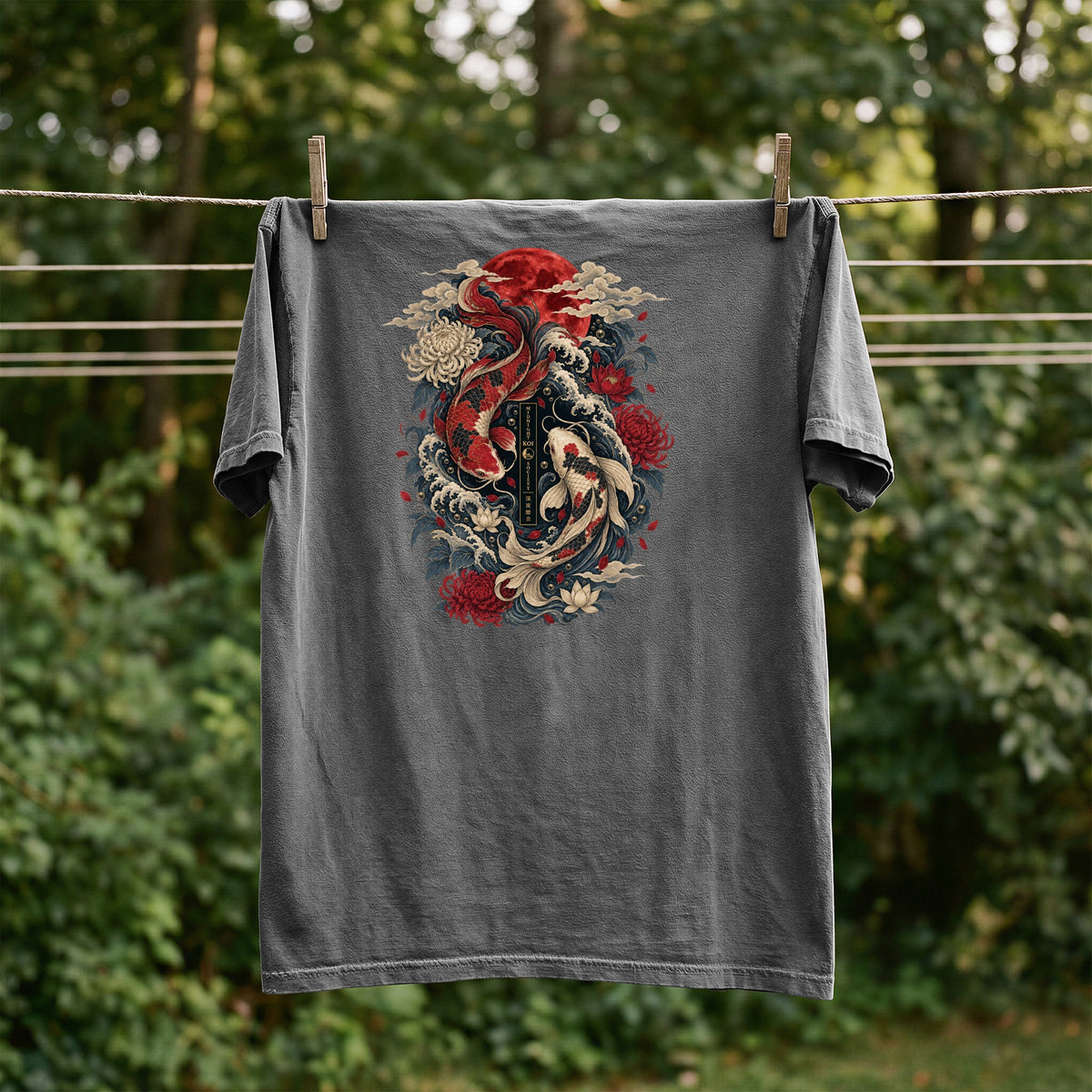 Dark grey t-shirt featuring a Japanese art print of koi fish, flowers, and waves.