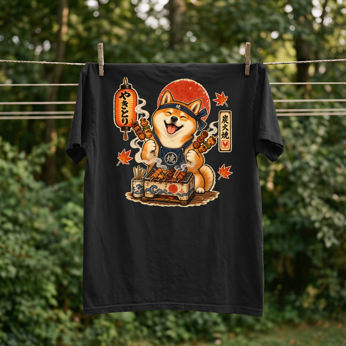 Black t-shirt with a Shiba Inu character grilling yakitori.